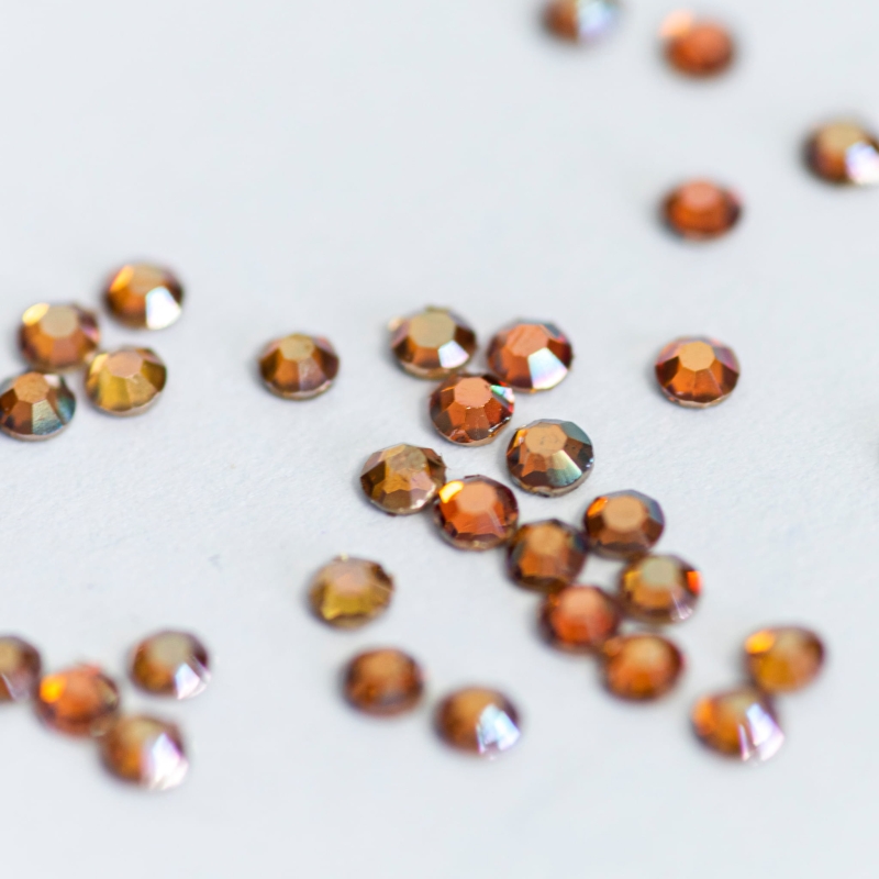 50 szt. Kryształki Amber rozmiar 5
